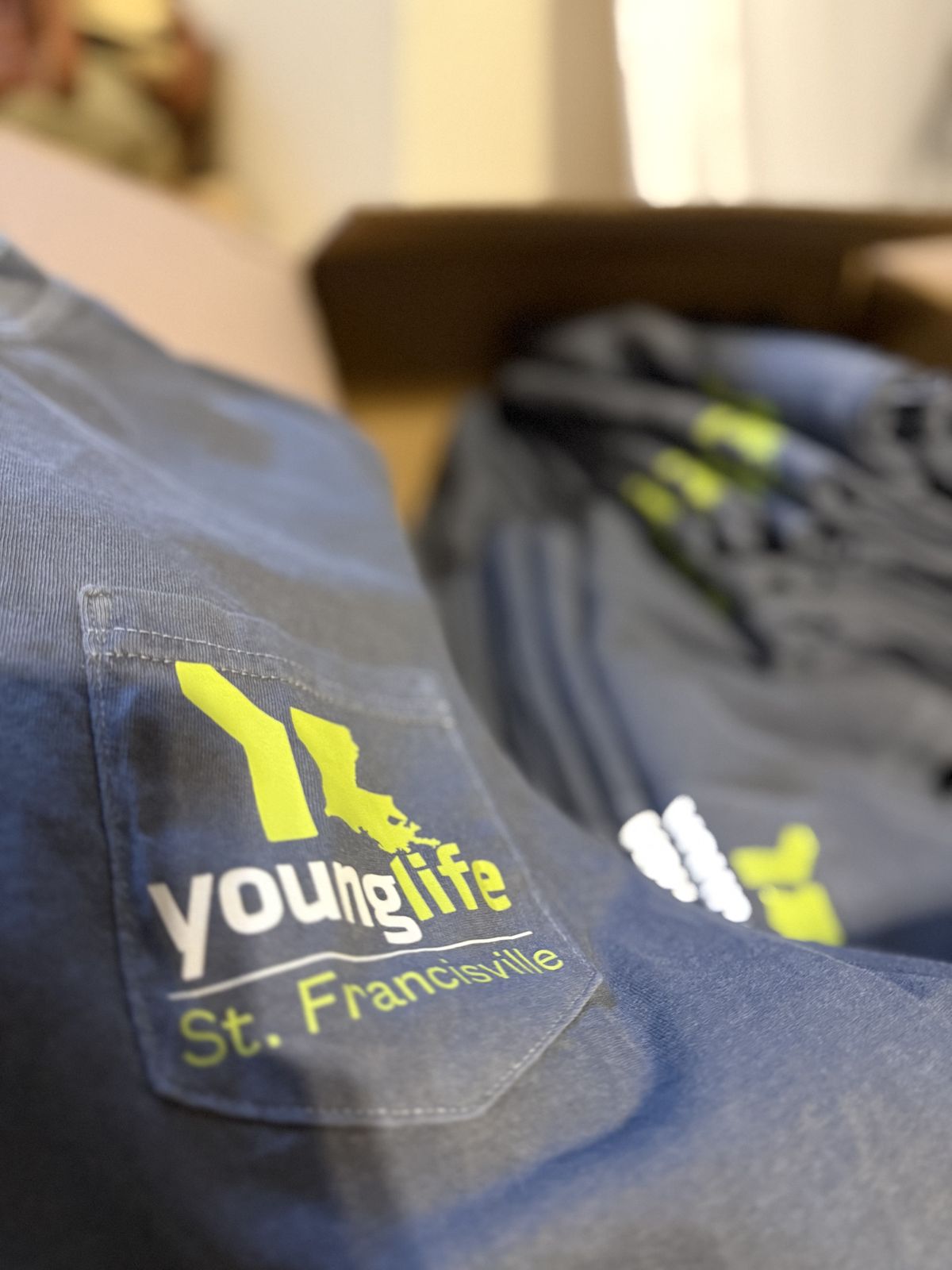 Screen printed pocket t-shirts for Young Life St. Francisville